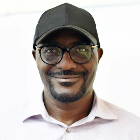 Dr. Grace-Edward Galabuzi